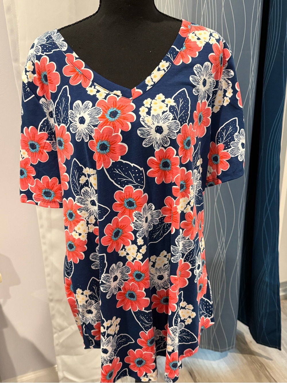 LuLaRoe Iris Navy V-Neck Short Sleeve Tee with Coral & White Floral Print